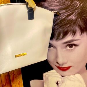 Charles Jordan, white and black purse bucket like